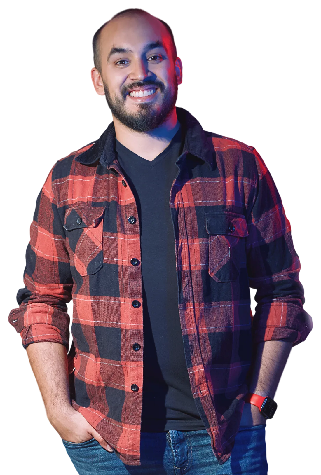 Rodrigo Rojo, sonriendo con camisa roja a cuadros